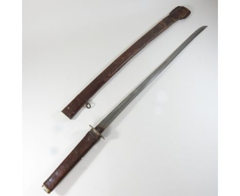 A World War II Japanese sword, in a leather scabbard, 106cm