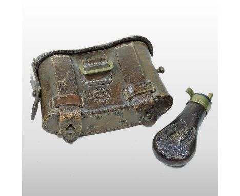 An early 20th century German NCO officer's leather ammunition pouch, stamped Coblenz, together with a powder flask, 10cm long