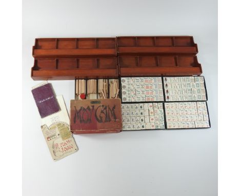 A vintage mah jong set, together with a set of tile racks