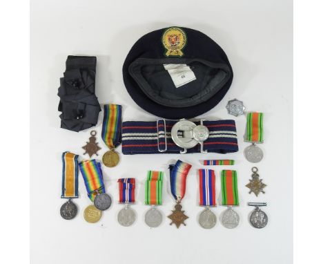 A collection of military items, to include World War I and II medals and belts, the World War I medals inscribed: 601 Spr F. 