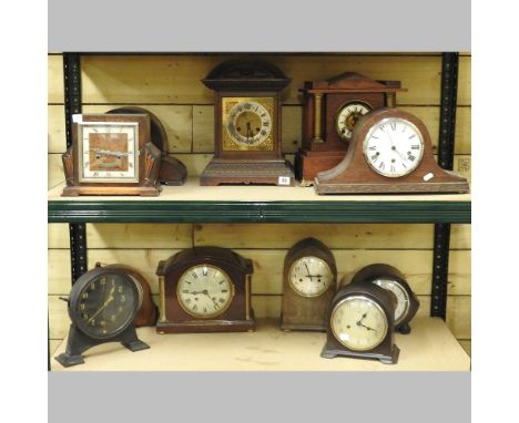 A collection of various clocks and clock parts