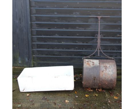 A cast iron garden roller, together with a butler's sink, 92cm