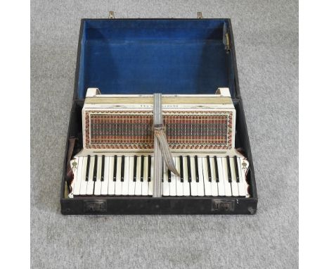 A piano accordion, cased