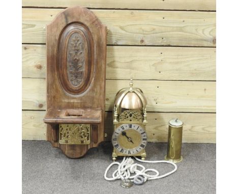 An 18th century style brass lantern clock, 40cm high, with a clock bracket