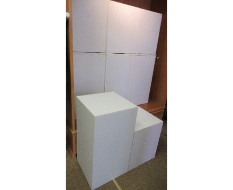 8 white cubic display boxes, four 20ins square, four 30ins square, together with two 3 x 4 cube white modern square shelf uni