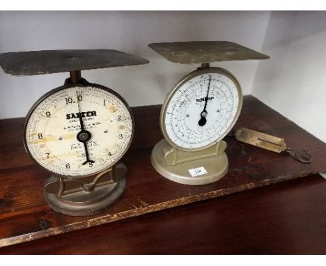 Two parcel letter scales, and a set of spring scales