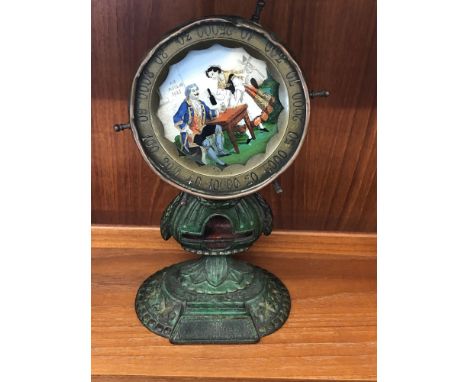Victorian cast iron match striker with enamel painted drinking scene, possibly French,  named Depose on base. 