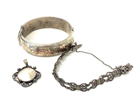Selection of silver jewellery includes silver bangle marcasite bracelet and pendant please see images 
