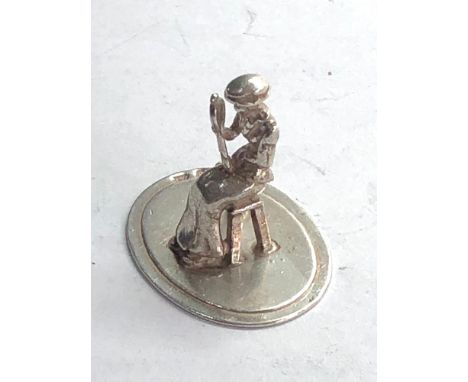 Dutch silver miniature girl looking into a mirror  dutch silver sword hallmark please see images for details 
