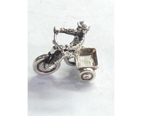 Dutch silver miniature boy on a scooter  dutch silver sword hallmark please see images for details 