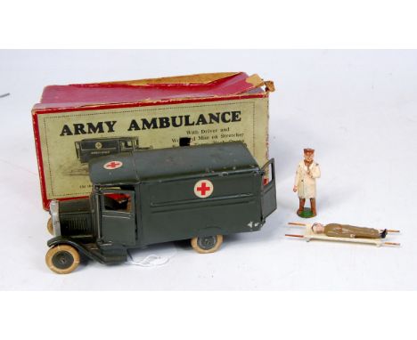 Britains No.1512 Lead Army Ambulance with driver, and wounded man on stretcher (Missing his left foot), plus another drive fi