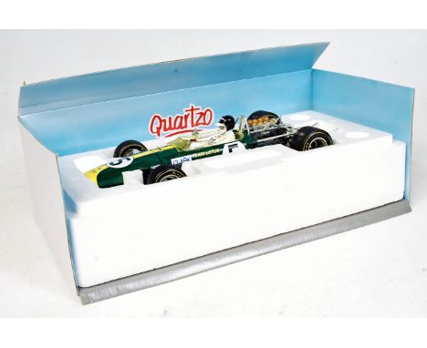 Minichamps and Quartzo 1/18th scale Formula 1 racing group, 2 boxed examples, to include Minichamps Tyrrell 003 1971 F.Cevert