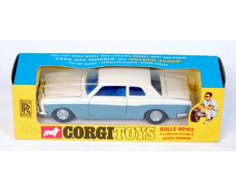 Corgi Toys, 273 Rolls Royce Silver Shadow, with golden jacks, pearlescent white upper, grey lower, blue interior, with model 