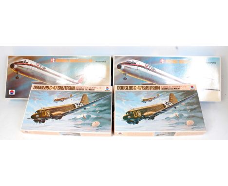 Nitto 1/100th scale plastic aircraft kit group, 4 boxed examples, to include 2x Nitto C-47 Douglas Skytrain, and 2x Nitto McD