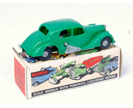 Triang Minic Post War, Reversing Riley, green plastic body with reversing button to front, chrome fittings, cast hubs, in the