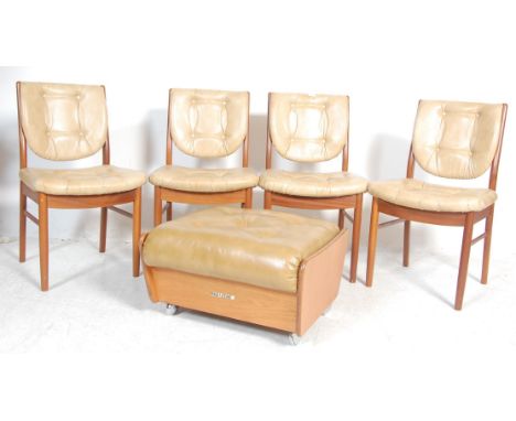 A set of four vintage retro G plan dining chairs having teak wood framed with faux leather back rests and seat panels with bu