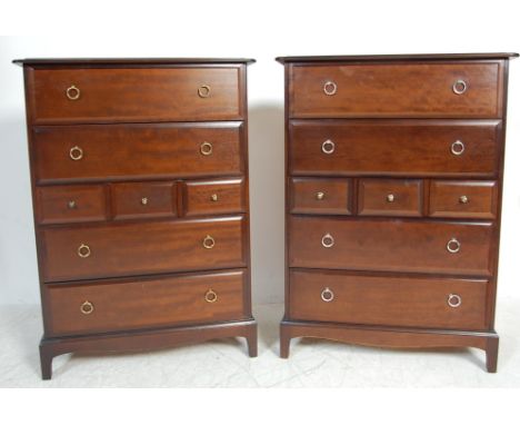 A pair of vintage retro 20th ceramic mahogany colour Stag Minstrel chest of drawers of a large pedestal form with short drawe