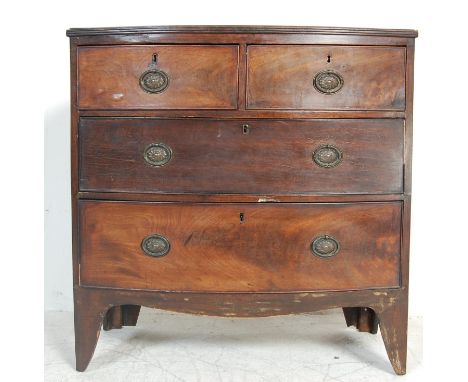 A 19th century Victorian mahogany bow front bachelor chest of drawers. The chest of drawers having a two over two configurati