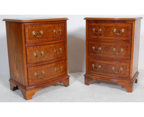 A pair of contemporary Georgian style bedside chests of drawers each having a bank of three drawers with twin brass swing han