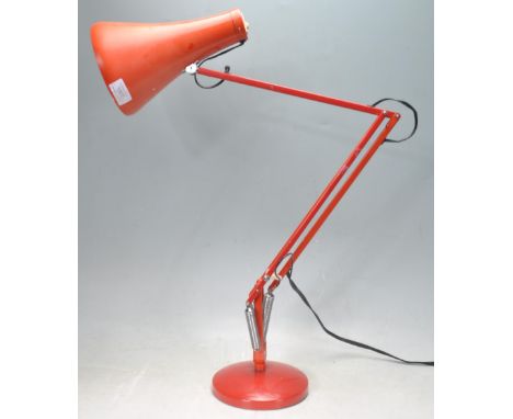 A retro vintage late 20th century desktop lamp having a square plastic base, spring loaded adjustable support &amp; a vented 