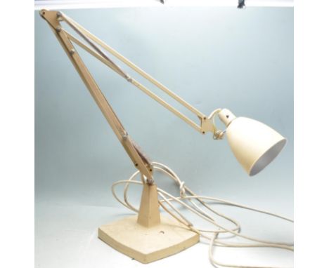 A retro vintage late 20th century industrial desktop lamp having a conical having a three arm sprung articulated adjustable l
