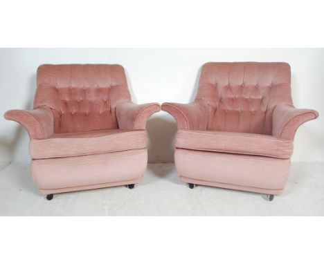 G Plan -&nbsp;A good matching pair of retro vintage mid 20th Century wingback easy armchairs / fireside lounge chairs having 