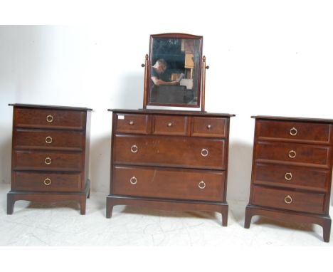 Vintage retro 20th century bedroom suite by Stag Minstrel. The bedroom suite comprising of two four drawers bedside cabinets 