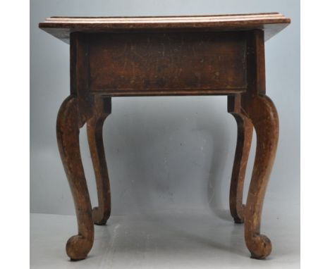 A 19th century Victorian Army & Navy CSL / A&N CSL fruit wood campaign stool. The stool of a square form with foliate motifs 