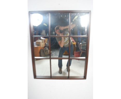 A contemporary vintage style nine panel " window " mirror of square form having a stained hardwood frame. Measures.