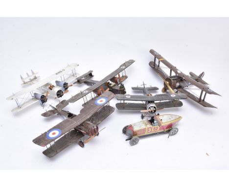 World War 1 Far East tinplate models of Aircraft and Tin Car, five Bi-Planes approx. 1:43 scale 0 gauge including four Fighte