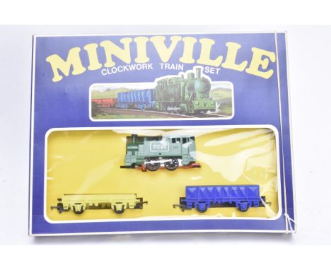 Rare Tri-ang RB 4M Miniville series 00 Gauge clockwork Train Set, comprising green 7321 0-4-0 tank engine, lemon yellow flat 