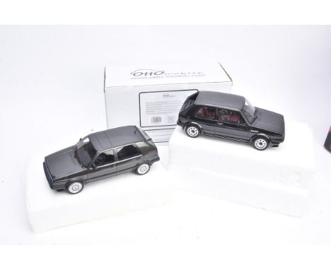 1:18 Scale Models By Otto, three boxed models 0T124 VW Golf (one windscreen wiper broken), OT551 VW Golf (some inner mould an