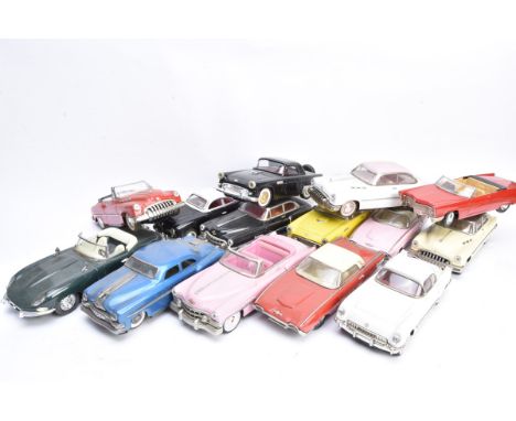 Japanese and other Tin Toy Cars, a group of 1:18 scale or similar mostly 1950's vintage American model cars with pull back dr