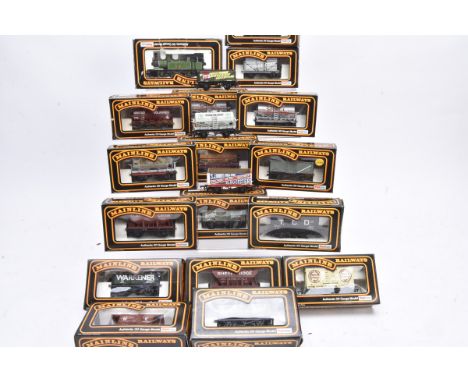 Mainline Railways 00 Gauge Tank Engine and various trucks, 37-054 LNER green J72 Class 0-6-0 Tank together with 16 trucks inc