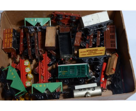 Assorted Hornby 0 gauge Post-war Freight Stock, including SR milk traffic van, NE refrigerator, 3 LMS hopper wagons, 4 barrel