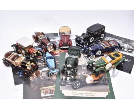 Franklin Mint 1:24 Scale Vintage Cars, an unboxed group comprising Al Capone's Armoured Cadillac, 1929 Bentley, 1910 Rolls Ro