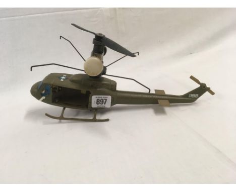 SMALL PLASTIC MODEL OF A US ARMY HELICOPTER WITH PETROL ENGINE, NOT KNOWN IF WORKING