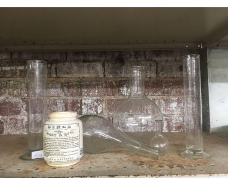 SHELF WITH VARIOUS GLASS CHEMISTRY ITEMS &amp; A BYNOL MALT &amp; OIL JAR