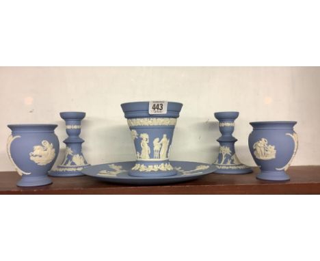 SHELF OF 6 WEDGWOOD JASPER WARE PIECES INCL; CANDLESTICKS, VASES ETC