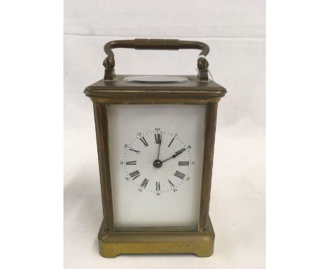 BRASS BODIED CARRIAGE CLOCK WITH STRIKING MECHANISM WITH PRESENTATION INSCRIPTION 