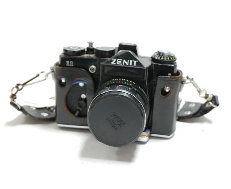 A Zenith 11 camera, in associated camera case, with Hanimex lens and one other lens (3)