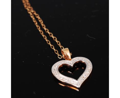 A 9ct gold diamond point set heart shaped pendant, on finelink neck chain 