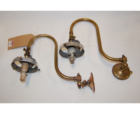 A pair of early 20th century brass single sconce wall light fittings, stamped Nico No.48