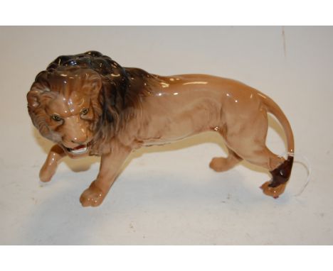 A Beswick model of a lion, model No.2554B, light brown gloss finish, h.17cm