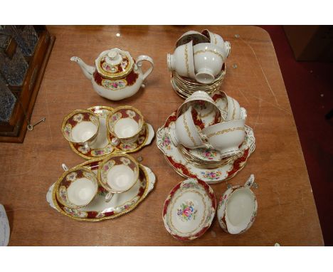 A Royal Albert part tea service in the Lady Hamilton pattern, together with a Royal Albert Canterbury pattern part tea/dinner