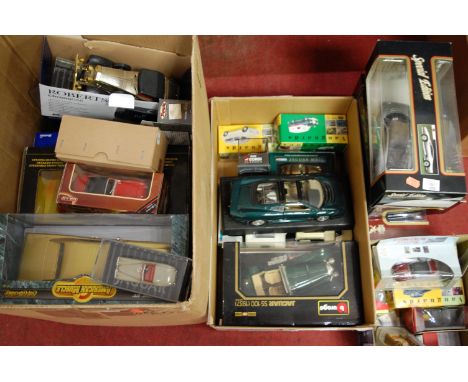 A large collection of mostly boxed modern issue diecast toy vehicles, to include; Maisto 1.18 scale model of a Jaguar XJ220, 