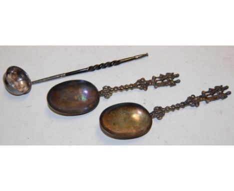 A pair of 19th century silver plated apostle type spoons with makers mark FWS and a 19th century white metal toddy ladle with