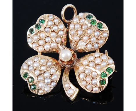 A modern 14ct gold seed pearl and emerald set brooch as a four leaf clover, 2.5cm