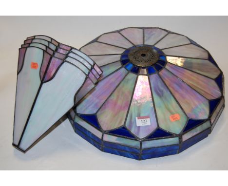 A modern Tiffany style leaded glazed ceiling light shade, together with a set of  four similar wall mounted shades (5)