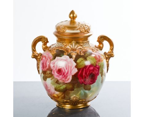 ROYAL WORCESTER LIDDED VASE
of shoulder oviform, with gilt and rose decoration, gilt handles and pierced neck, puce factory s